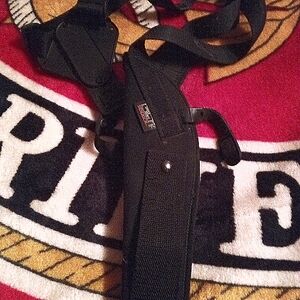 UNCLE MIKE'S vertical shoulder holster.